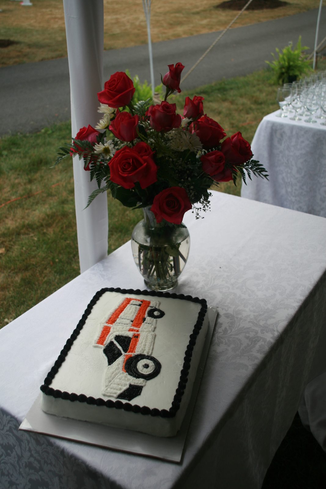 The groom's cake.  That vehicle is an ambulance, as both Jason and Amber run rescue with CARS.